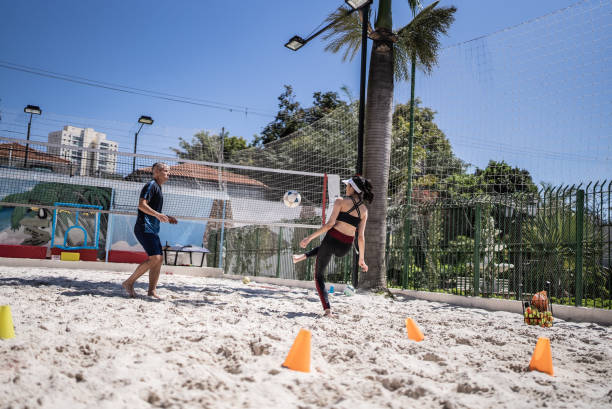 istock Woman training in a sand court 1430438213