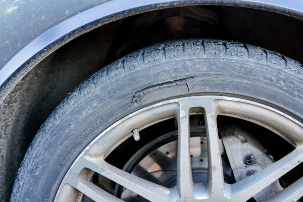 istock Large long mechanical cut damage on tire sidewall 1430439317