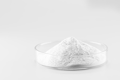 Hydrolyzed Collagen Powder, in the laboratory, pharmaceutical product for use in the food industry, isolated background and copyspace