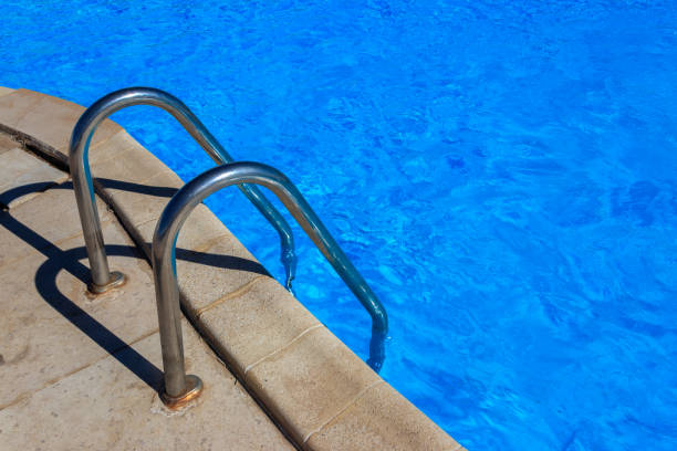 Colorful buoy on the water of a blue swimming pool.\nÁguas de Lindóia, SP - Brasil.