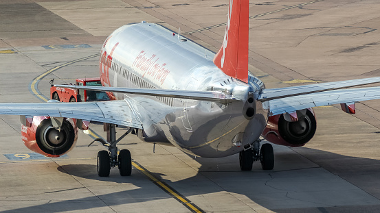 Manchester Airport, United Kingdom - 30 August, 2022: Jet2 Boeing 737 (Reg Unknown) being pushed back for take off.
