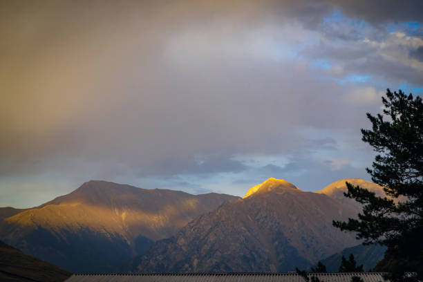 istock Sunset in the mountains. Rays fall on the mountains. 1430456199