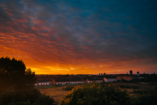 Dramatic landscape view on a city in the UK at sunrise