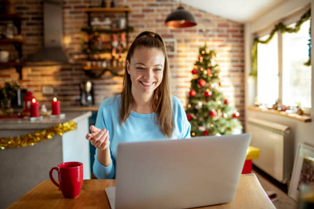istock Woman using a laptop at home 1430469626