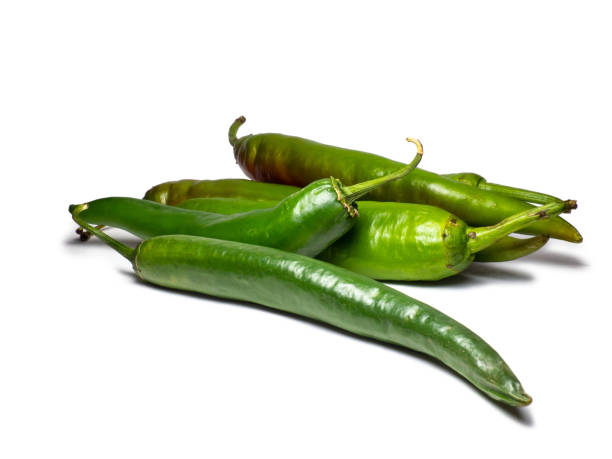 istock Fresh green chili peppers. Spicy vegetable isolate. Peppers on a white background. Ingredient for dishes. The concept of spicy food. Fresh . Harvesting vegetables for seasonings. 1430503355
