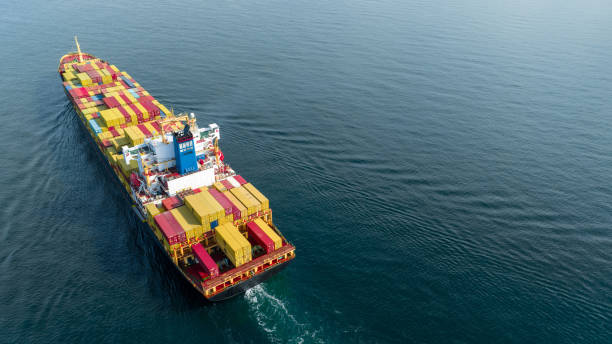 istock Stern of large cargo ship import export container box on the ocean sea on blue sky back ground concept transportation logistic and service to customer and supply change 1430508797