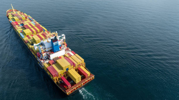 istock Stern of large cargo ship import export container box on the ocean sea on blue sky back ground concept transportation logistic and service to customer and supply change 1430508827