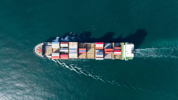 istock Cargo container Ship, cargo maritime ship with contrail in the ocean ship carrying container and running for export  concept technology freight shipping sea freight by Express Ship 1430508828