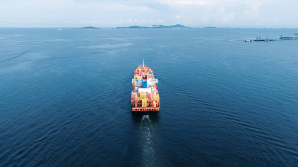 istock Stern of large cargo ship import export container box on the ocean sea on blue sky back ground concept transportation logistic and service to customer and supply change 1430508833