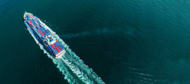 istock Cargo container Ship, cargo maritime ship with contrail in the ocean ship carrying container and running for export  concept technology freight shipping sea freight by Express Ship 1430508862