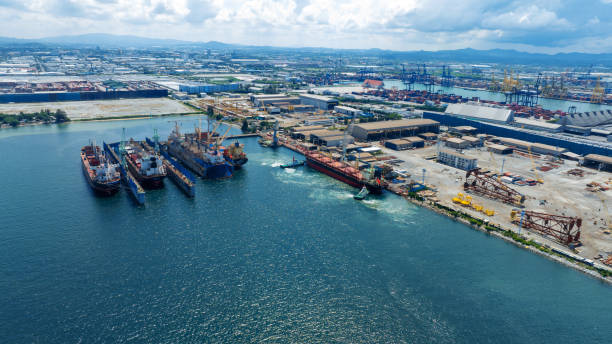 istock cargo container ship at dry dock concept maintenance service working in the sea. Insurance and Maintenance Cargo Ship concept. Freight Forwarding Service maintenance Insurance 1430509044