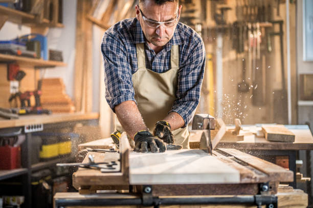 istock Craftsman sawing board on circular saw 1430510905