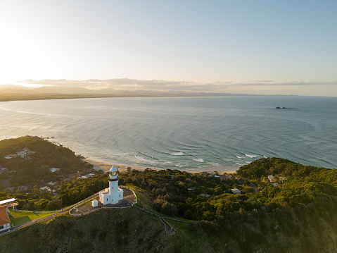 Byron Bay, NSW, Australia - October 29, 2018: People enjoying the sunny weather on the Byron Bay's lighthouse, a popular destination with beaches and coastal trails on the North Coast of NSW, Australia.