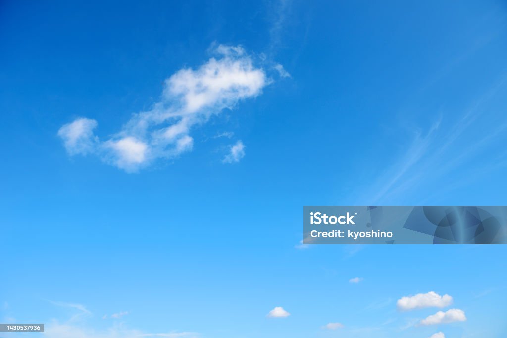 Blue sky with white clouds Blue sky and white clouds with copy space. Blue Stock Photo