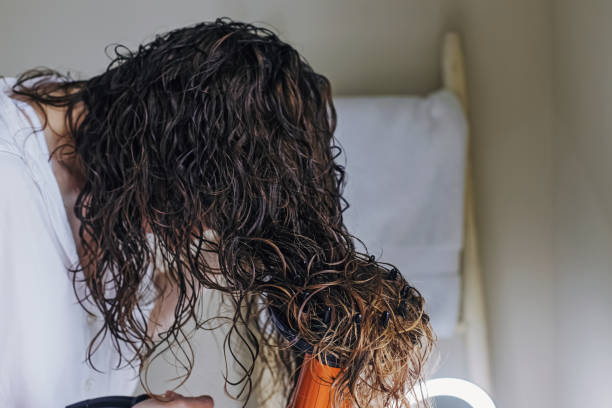 istock Drying hair according to curly method for hair styling 1430541490