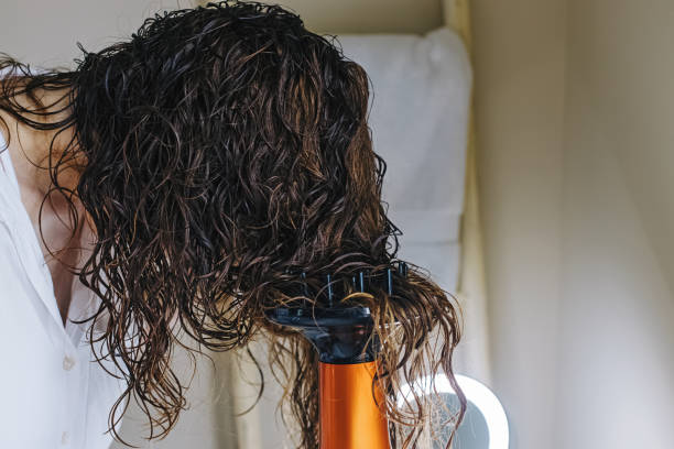 istock Drying hair according to curly method for hair styling 1430541499