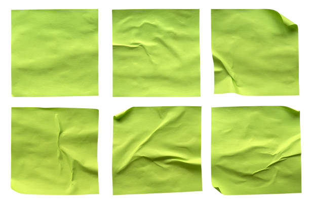 istock A set of blank fluorescent green rectangular paper glued crumpled and creased note memo isolated on white background. 1430542119
