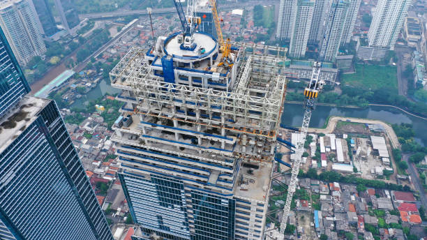 istock Top down view on different sky scrapers in a big city, fly over 1430544511