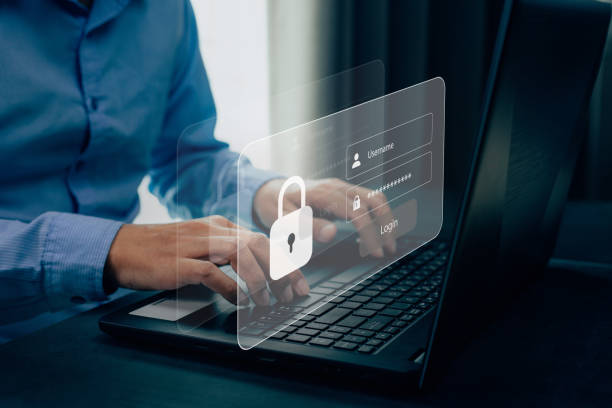 istock Businessmen protecting personal data on laptop and virtual interfaces. 1430544589