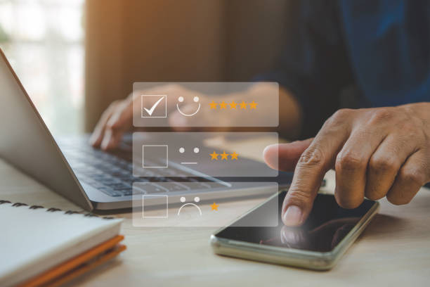 istock User give rating 5 star to service experience on online application. 1430544971