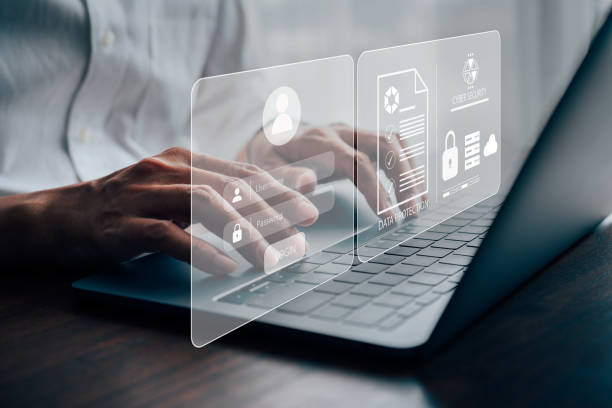 istock Businessmen protecting personal data on laptop and virtual interfaces 1430544976