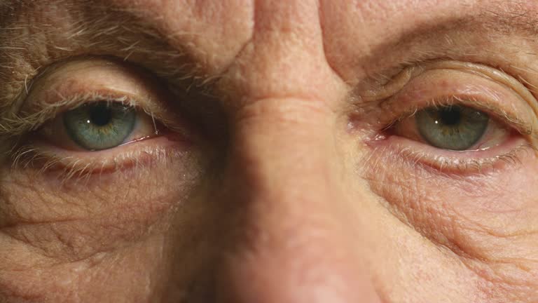 Senior man, eyes and deterioration of health and eyesight of elderly man with wrinkles. Nostalgic elderly male with dementia, glaucoma or alzheimers feeling forgetful and suffering from memory loss