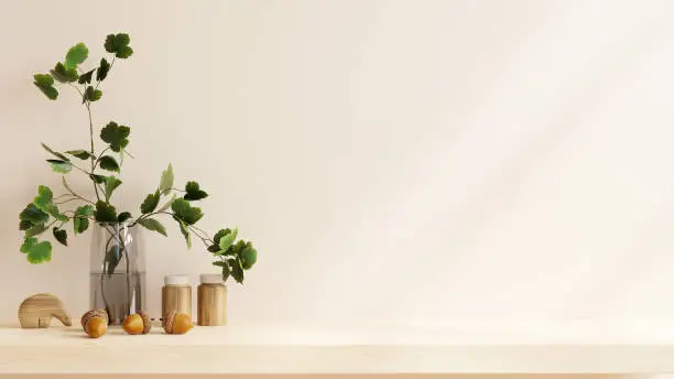 Photo of Cream color wall mock up with Vase and green plant on wooden shelf.