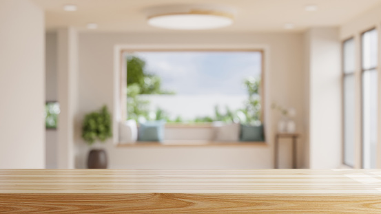 istock Empty wooden table with blurred view of scandinavian living room. 1430552264