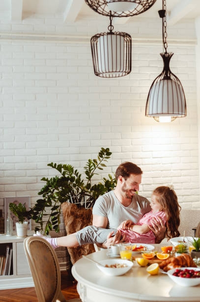 istock Father and daughter having breakfast fun 1430554074