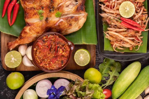 istock Thai papaya salad in a black plate. 1430560415