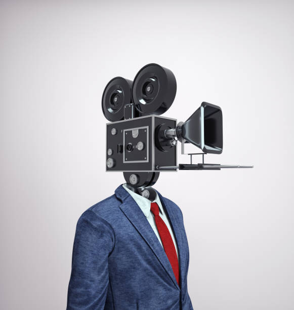 Businessman with a camera instead of head.