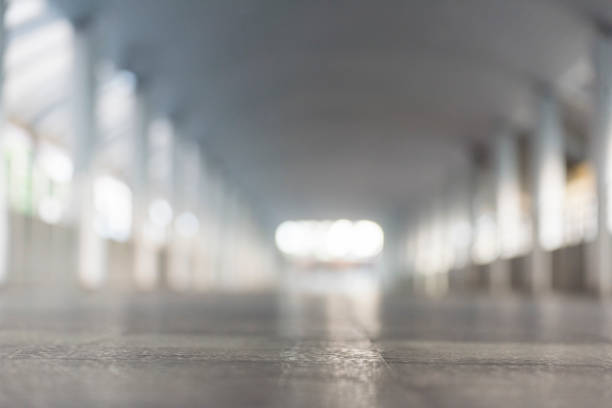 istock Blurred background bright shopping mall Silver gray lighting. defocused store light bokeh in retail store. Blurry hospital bright softness hotel with copy space. Backdrop present design template. 1430566830