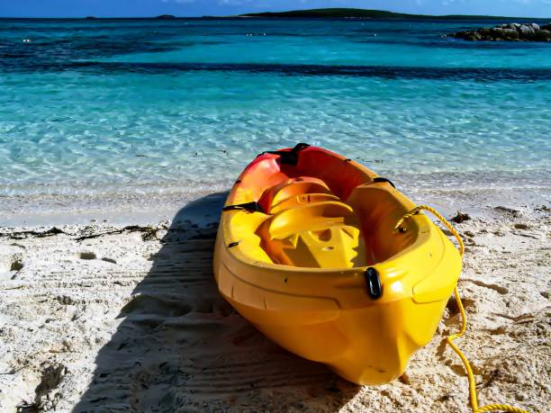 istock Yellow Kayak sitting on the beach 1430573267