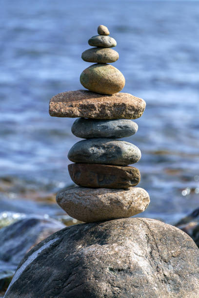 istock Pyramid of stones. Unstable balance of stone objects. 1430588461