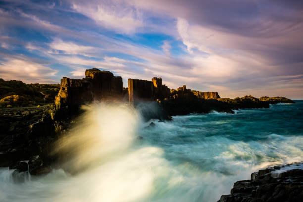istock Wave Crashing against Cliff along Bombo Headland Quarry 1430588560