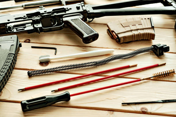 istock Gunsmith's working table for gun cleaning and maintaining 1430590756