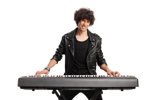 istock Young man with curly hair playing a digital piano 1430599175