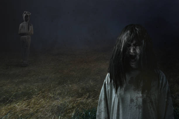istock Scary ghost woman and pocong standing 1430600173