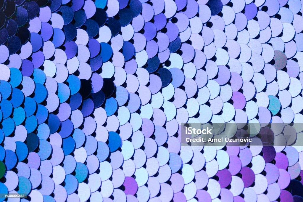 Colorful shiny squama shapes textured background. Graduated shades of blue, green and purple color. Repeating pattern. Flat design. Abstract Stock Photo