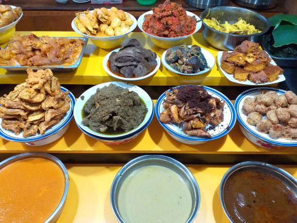 Indonesian West Sumatran Food - Nasi Padang Assorted Dishes in a Restaurant.