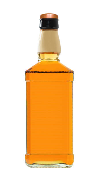 istock Full whiskey bottle isolated on white background 1430610343