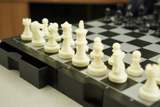 istock Sport Game : The image shows a chessboard ready to compete in a board game, close up. 1430610932