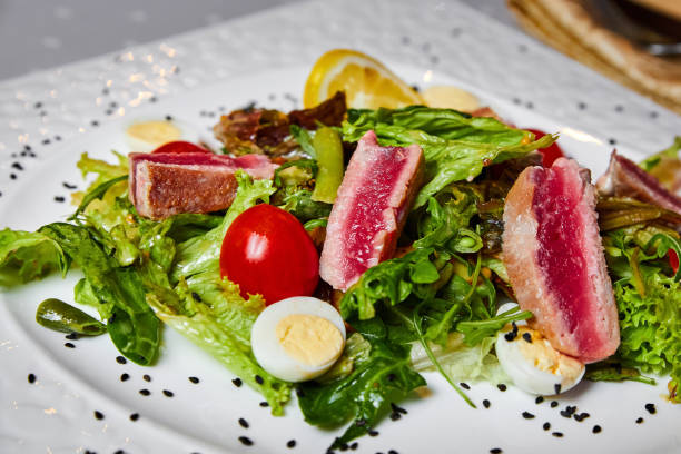 istock Nicoise salad with medium-roasted tuna, mixed salad and quail egg 1430613783