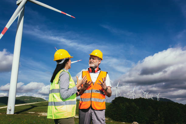 istock Windmill engineer inspection and progress check wind turbine at construction site 1430614215
