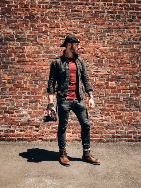 istock casual photographer against the wall 1430621288