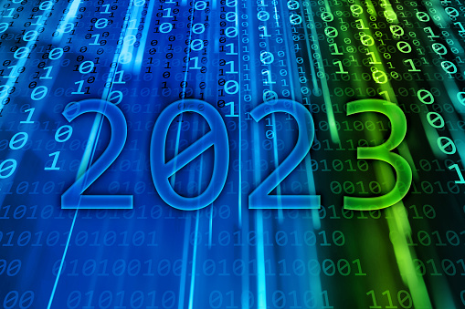 2023 text written on a flowing binary code background. New Year 2023 celebration concept.