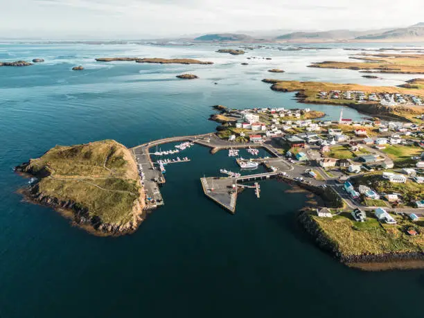 Stykkishólmur is a town situated in the western part of Iceland, in the northern part of the Snaefellsnes peninsula. It is known for its red lighthouse and the fishing harbor.
Aerial view on a calm day.