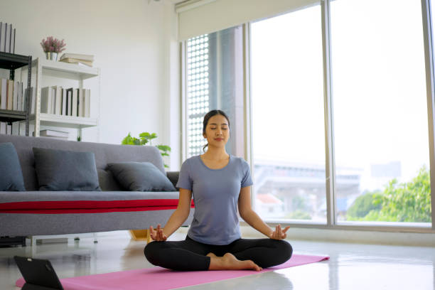 istock Young woman exercise at home. 1430625575