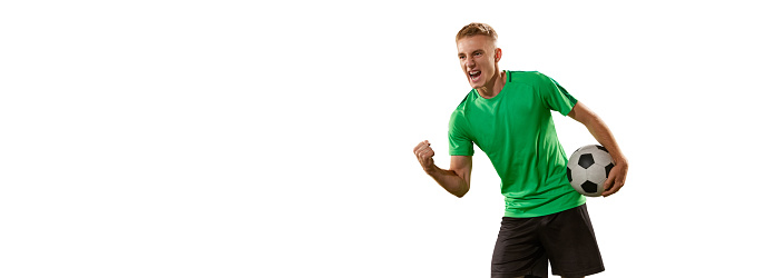 Goal. Excited football player shouting, expressing win emotions isolated over white background. Sport, win, victory, champion and success concept. Copy space for ad