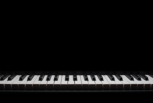 Electric piano keyboard on a black background for advertising